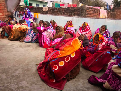 Providing warm blankets for poor elderly villagers in the cold winter months